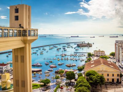 Salvador, BA, Brazil - February 17, 2016: view od the historic architecture of Salvador in Bahia, Brazil showcasing an stoniching panoramic of the Bahia de Todos os Santos bay with all of its historic and iconic places on a sunny day.